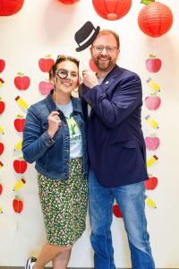 A smiling couple posing for the camera