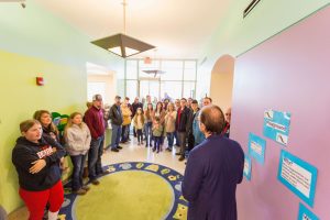 Man leading group on daycare tour