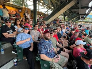 Group of people at baseball game