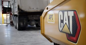 Close up of heavy machinery in a garage.
